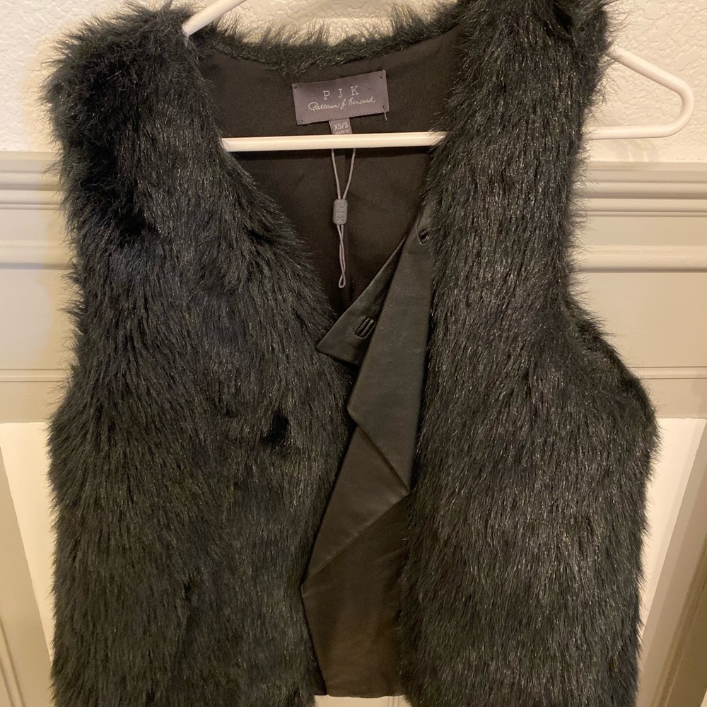 Black faux fur vest with faux leather lining